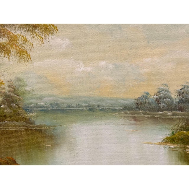 Golden haze settles on calm waters, holding a cottage in quiet reverie 1975 Circa For Sale - Image 4 of 18