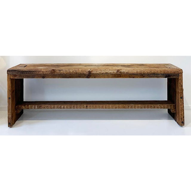 This one-of-a-kind reclaimed wood console is a striking balance of rustic character and minimal form. Hand-constructed...