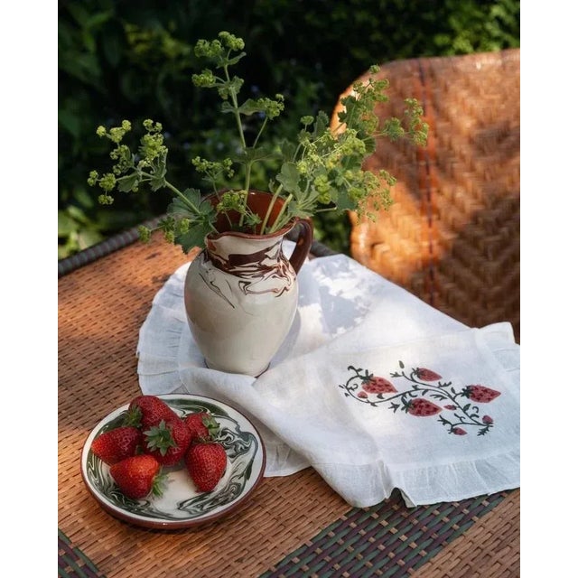 Inspired by a vintage Suzani, our Fraises Des Bois collection features an intricate hand-blocked strawberry motif, layered...