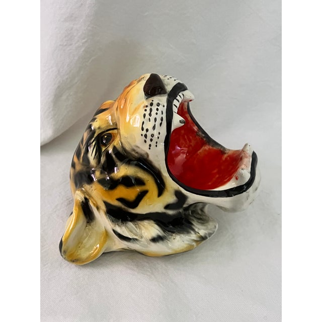 Striking vintage tiger head wall sculpture with an expressive open-mouth design and beautifully painted gold, black,...