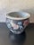 Vintage Chinese import porcelain planter with a dramatic black ground and colorful hand-painted floral, butterfly, and...