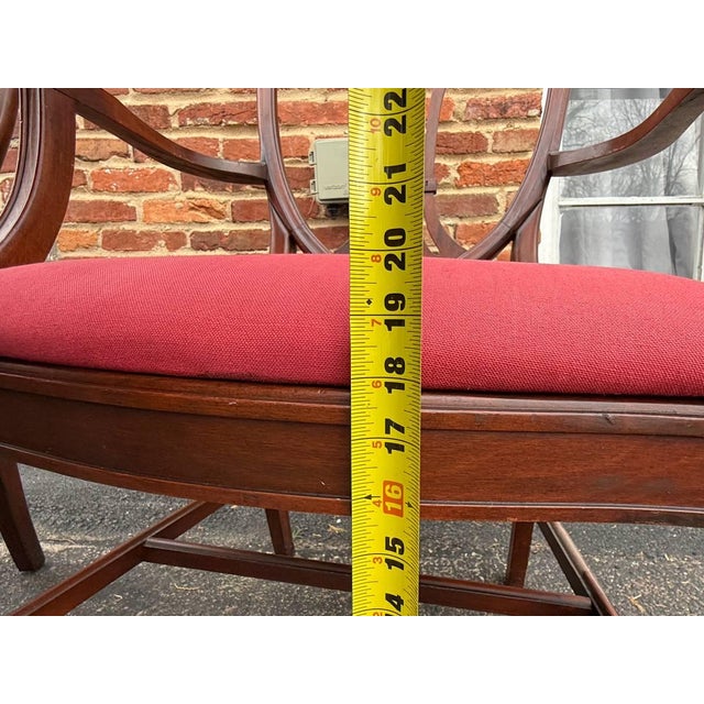 Pair of Antique Federal Hepplewhite Style Shield Back Arm and Side Chairs Solid wood frame, shaped top, carved open splat...