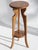 A vintage Art Deco two tiered pedestal made in Amsterdam School style. The table is from the 1930's and is made in the...