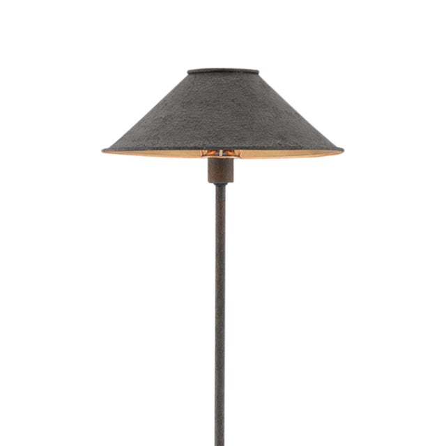 The Fudo Floor Lamp is made of wrought iron in a Mole black finish. This creates contrast with the polished concrete base...