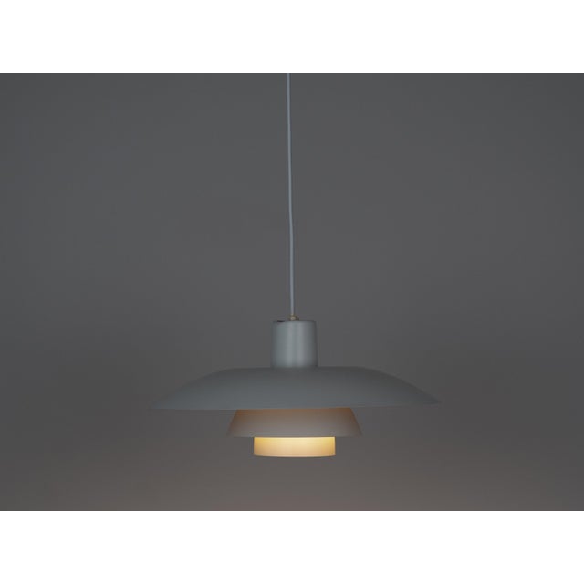 The ph 4/3 lamp is an absolute classic, designed by the renowned danish designer and architect poul henningsen. It has...