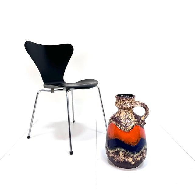 This impressive fat lava floor vase was manufactured by Dümler & Breiden in West Germany during the 1960s. This piece has...