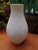 A white, elegantly shaped bisque porcelain vase, Alka Kunst Alboth & Kaiser Bavaria Vintage, with a delicate millefleur...