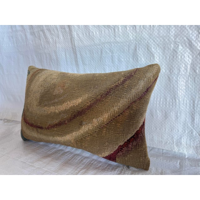 17th century Flemish tapestry decorative pillow made from an authentic handwoven wool tapestry fragment. The textile...