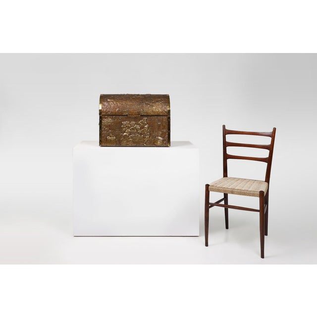 A beautiful large storage or treasure chest crafted in wood and covered in sculptured copper relief. Crafted in Belgium in...