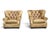 This pair of oversized tufted leather armchairs combines classic English design with the tailored elegance often...
