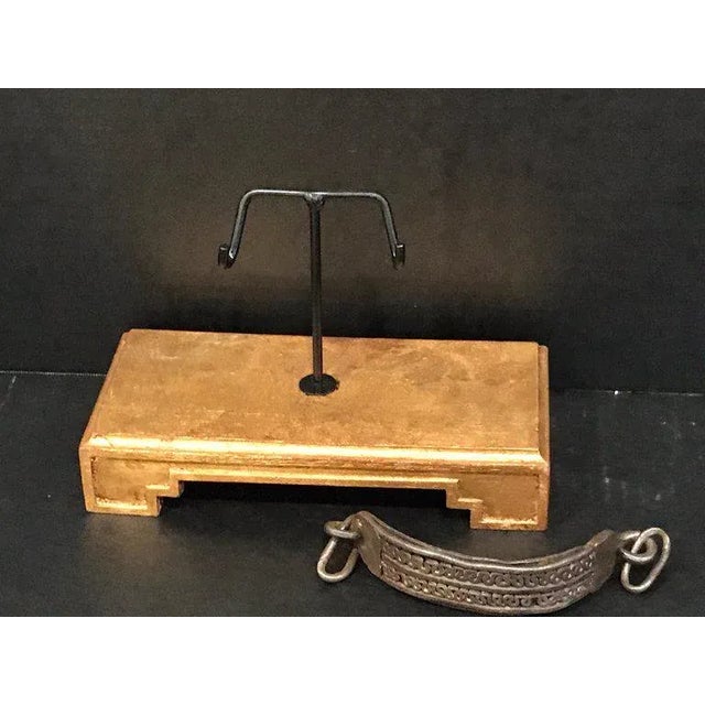 17th century iron dog collar, museum mounted on rectangular giltwood base. With two rows of neoclassic ironwork. The 6" x...