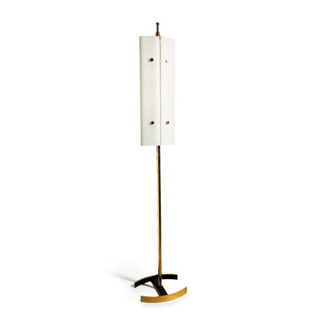 Arredoluce Floor Lamp Model "12707" by Angelo Lelii, Italy, 1950s. This elegant brass and glass floor lamp features a...
