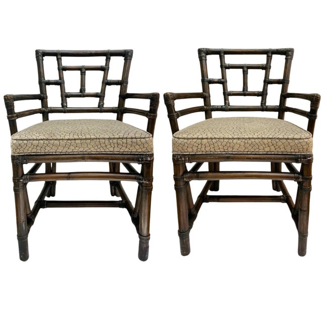 Beautiful pair of late 20th century Chinese Chippendale style leather wrapped rattan armchairs by McGuire San Francisco....