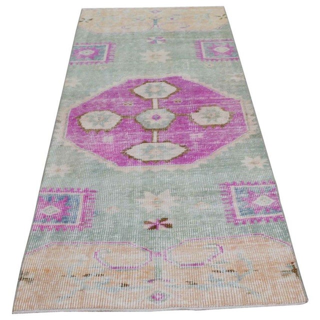 Hand-knotted with care using traditional rug-making techniques, this wool rug blends timeless craftsmanship with a modern...