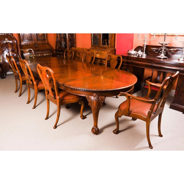 This is a fabulous antique Queen Anne Revival burr walnut dining table by the renowned retailer and cabinet maker Maple &...