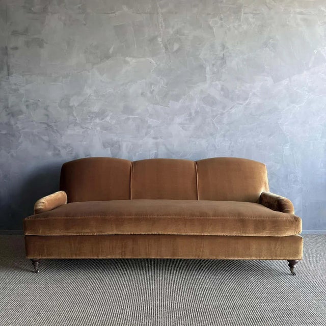 This beautiful english arm sofa has a modern twist, with its single bench cushion, and beautiful curved apron sides. It’s...