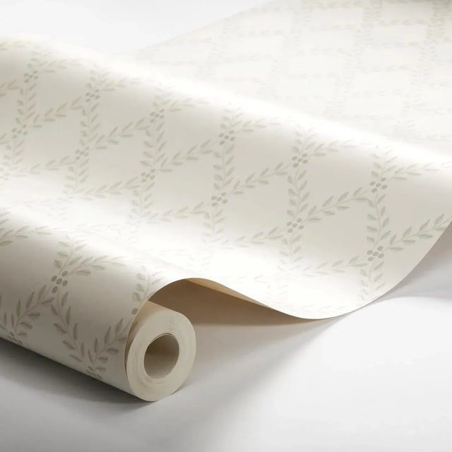 The wallpaper by BorÃ¥stapeter is a classic trellis print of elegantly arranged foliage. Trellis Leaves in natural makes a...