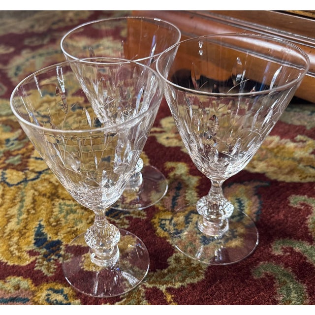A refined vintage “starter set” of Duncan & Miller Willow crystal—perfect for intimate entertaining or building a larger...