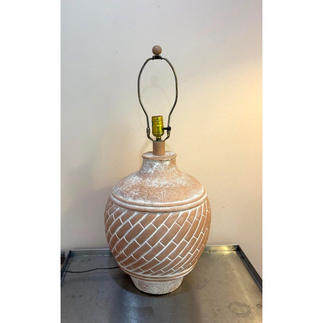 1970s-80s terra cotta brick pattern table lamp. Excellent condition. Measurements 28" tall including harp & finial 21"...
