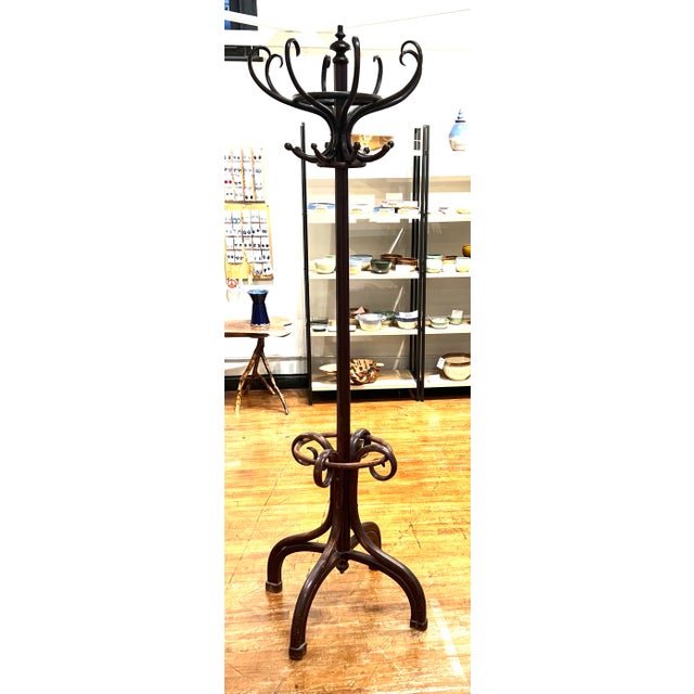 Beautiful Thonet style hall tree. Measures 84” tall. Nice finish. Great condition.Turn of century old.