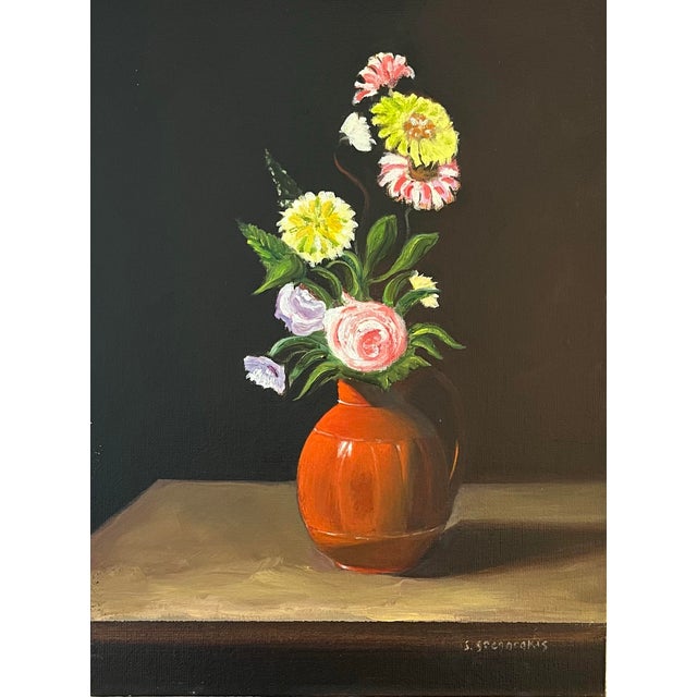 Oil painting on canvas board of yellow and pink daisies and roses in an orange vase set on a table by Satori Gregorakis....
