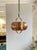 This pendant lamp was manufactured by Temde Leuchten, a German lighting company, during the 1970s as part of the Mid-...