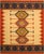 A handwoven wool kilim, made in India and measuring 9' x 12'. Kilims carry no pile — the pattern is woven through the...