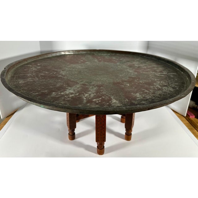 North African Copper Tray with Folding Table Base for your consideration. The overall dimensions measure approx. 11 inches...