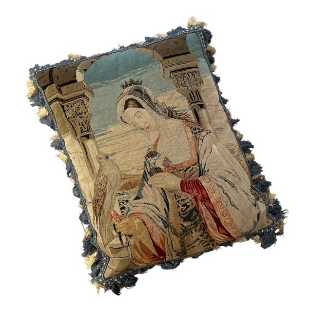 This pillow features a lady holding a hunting falcon, surrounded by architectural columns. The imagery itself evokes a...