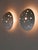 Set of two extremely rare, elegant and highly decorative mid-century modern wall lights / sconces with perforated lamp...
