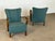 A pair of Danish lounge chairs with open bentwood armrests, Denmark, 1940s. The backrest rises to a softly flared upper...