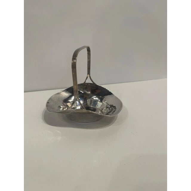 Sterling Silver Basket with Handle, Early 20th Century