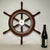 Mahogany boat wheel with a chrome plated hub and six turned spokes. Varnish finish. From a small craft. Weight: 6 lbs....