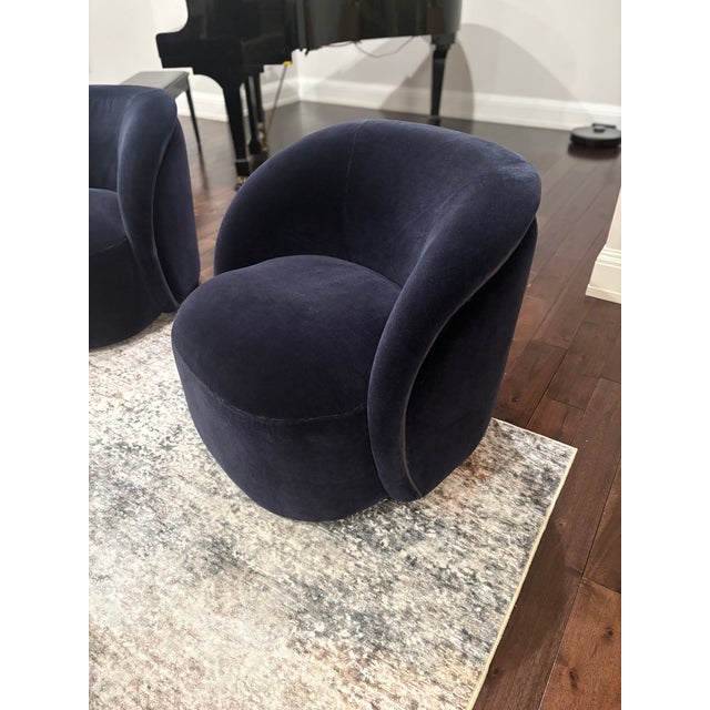 Brand new, still in box. Recently purchased, but no longer works with our current living room setup. Unique swivel chair...