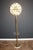 This spectacular Sputnik floor lamp looks like a flowers explosion.It features a multitude of brass rods ending with bulbs...