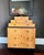This stunning, rare, Biedermeier style burl wood and primavera highboy dresser was made by Baker Furniture USA, circa...