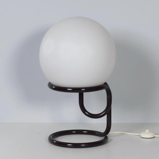 Aldo van den nieuwelaar globe lamp. Early table lamp for domani design from the 1960s with a matte opaline glass globe...