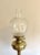 Wonderful quality antique Edwardian brass oil lamp, having a quality antique Edwardian brass oil lamp, with a glass...