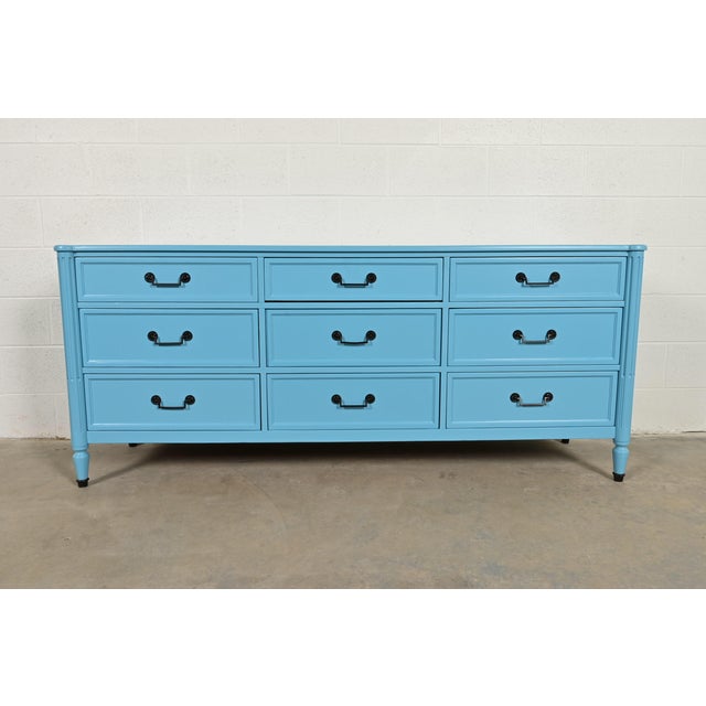 A gorgeous French Regency Louis XVI style dresser or credenza By Baker Furniture USA, Circa 1960s Carved walnut, in...