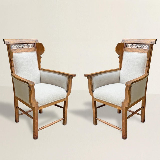 These mid-20th-century French wing chairs have all the ingredients of traditional country furniture, but someone clearly...