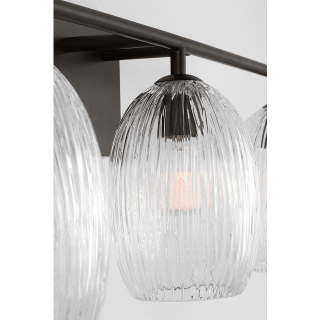 Serafina 27-inch Vanity by Hable extends the collection's organic elegance with a wider composition of sculptural glass...