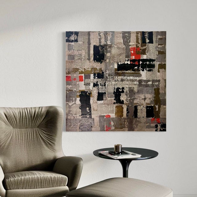 Disrupt by J. Kent Martin energizes a muted field of grays, taupes, and deep neutrals with sharp interruptions of red and...