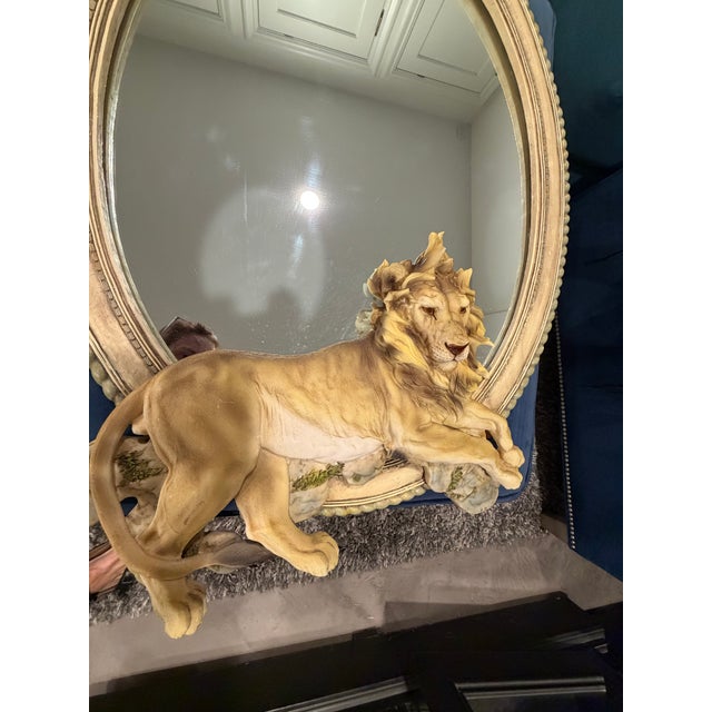 Make a statement with this lion themed mirror. The lion is crafted from resin or plastic with the rest of the frame in...