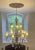 An exceptional Fine Art Lamps A Midsummer Night's Dream 57-inch three-tier chandelier in the collection's signature cool...