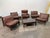 This rare and cohesive leather lounge set from the 1960s is attributed to Carl Straub and exemplifies the relaxed...