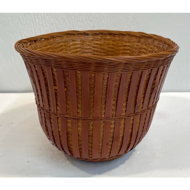 Nice vintage oval woven basket with wooden base