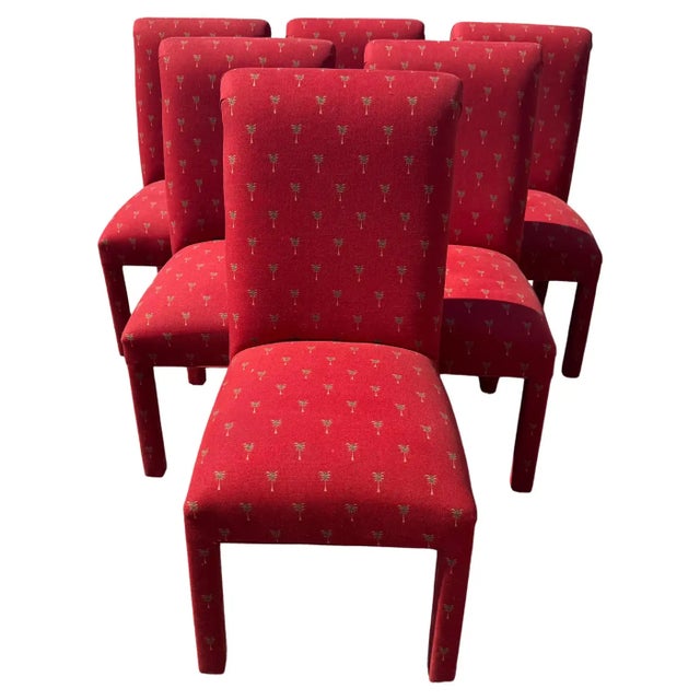 This set of dining chairs are made in the Parsons style. They are fully upholstered and have scrolled backs.