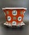 This vintage Chinese planter pot with matching tray features a repeating, hand-enameled design of Qilin and star motifs...