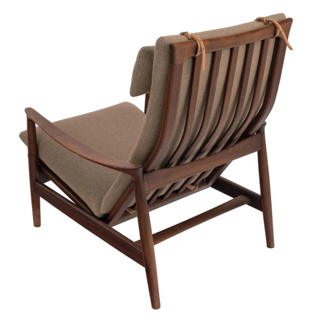 A good original Danish Mid Century Modern teak & upholstered armchair, designed by Arne Vodder, circa 1960. The chair...