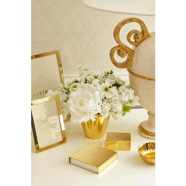 Classic, contemporary, and minimal, with a polished gold finish, the Martin is an elegant, heavy frame that works well in...